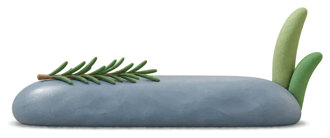 A smooth grey clay river stone with a sprig of rosemary lying on it